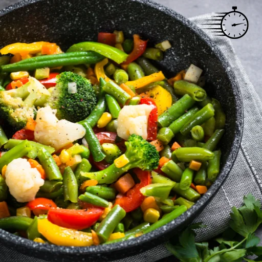 Delicious vegetable stir fry with a variety of vegetables such as carrots, broccoli, and bell peppers, topped with sesame seeds and served in a modern white bowl.