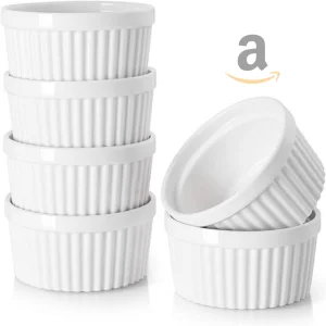 A set of white ceramic ramekins, oven-safe, ideal for baking and serving individual portions