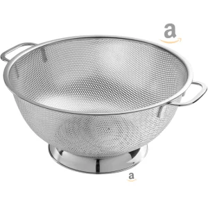 A stainless steel colander with perforated holes and handles.
